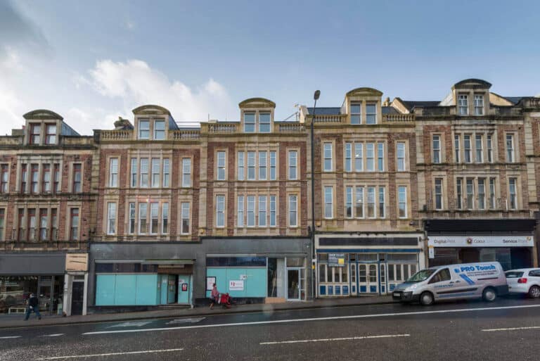 Historic terraced buildings on a cloudy day in UK