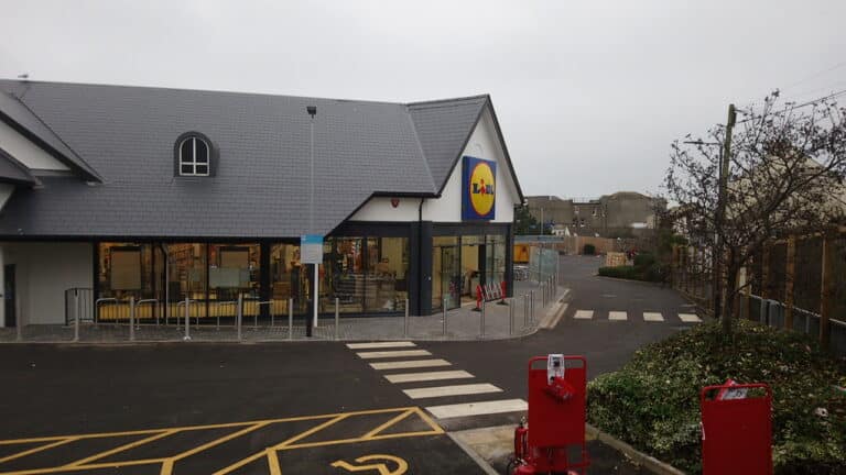 Lidl supermarket exterior with logo and parking lot