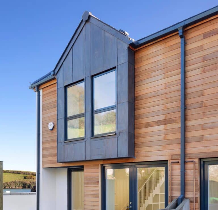 Modern eco-friendly house with wooden and metal facade